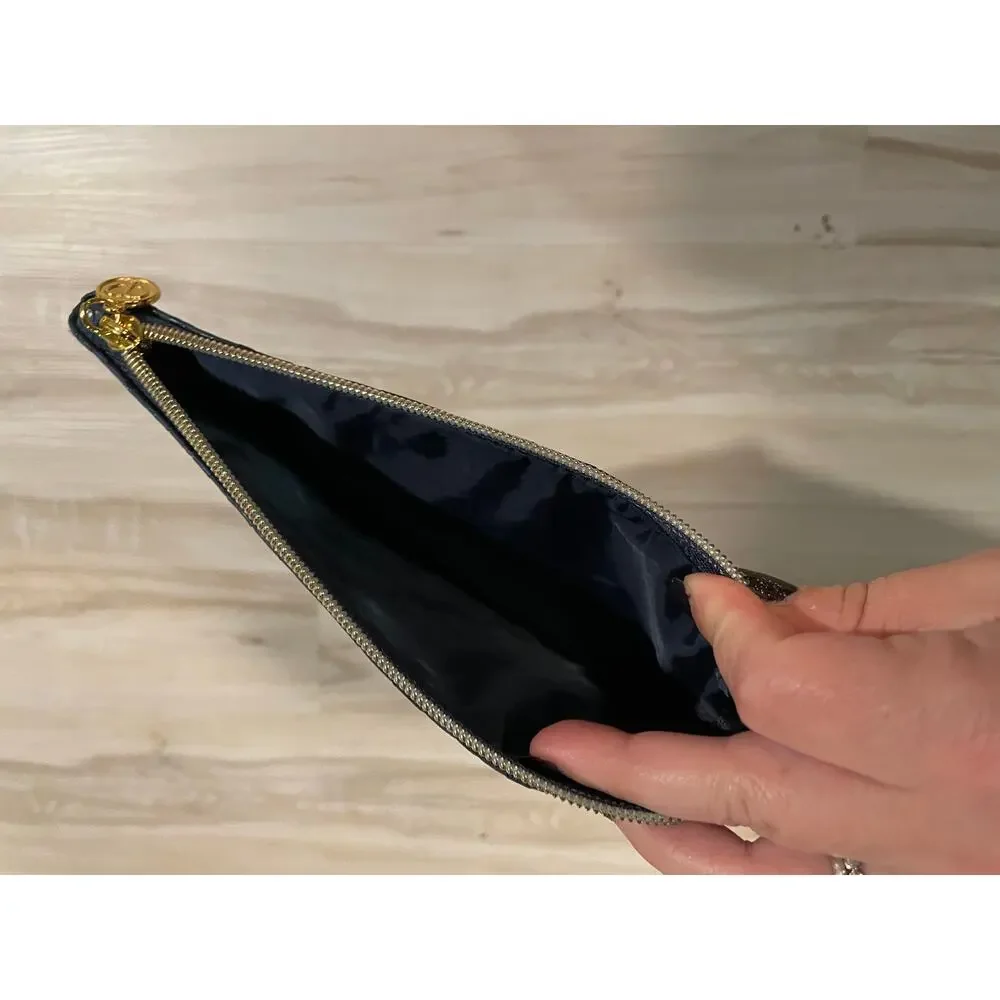 Cle de peau beaute navy snakeskin makeup bag